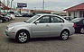 Show more photos and info of this 2006 Kia Optima.