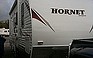 Show the detailed information for this 2010 KEYSTONE HORNET 26RBS.