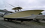 Show more photos and info of this 2005 Triton 3500 CC with Triple 250s.