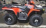 Show the detailed information for this 2009 POLARIS SPORTSMAN 500 HO 4X4 RED.