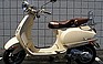 Show the detailed information for this 2009 Vespa LXV 150.