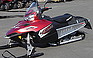 Show the detailed information for this 2010 POLARIS IQ 600 CFI LX SUNSET RED.