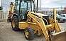 Show the detailed information for this 2000 JOHN DEERE 310E.