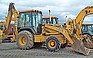 Show the detailed information for this 2000 John Deere 410E.