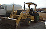 Show the detailed information for this 2003 JOHN DEERE 210LE.