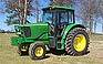 Show the detailed information for this 2003 JOHN DEERE 6415.