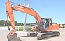 Show the detailed information for this 2004 HITACHI ZX200 LC.