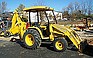 2004 JOHN DEERE 110 TLB.