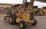 Show the detailed information for this 2004 JOHN DEERE 210LE.