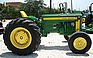 Show the detailed information for this 1956 John Deere 420U.