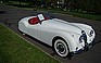 Show more photos and info of this 1957 Jaguar XK-140.